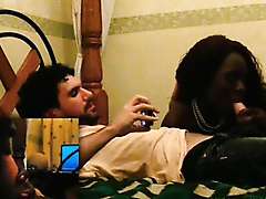 Afro temptress giving oral sex to a